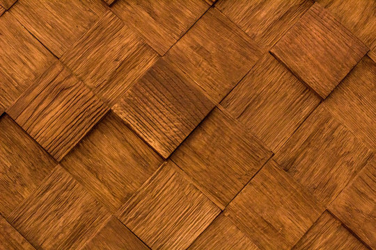 Natural wooden diagonal background pattern of golden brown pieces
