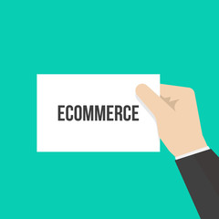 Man showing paper ECOMMERCE text