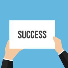Man showing paper SUCCESS text