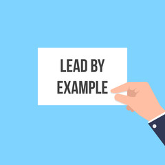 Man showing paper LEAD BY EXAMPLE