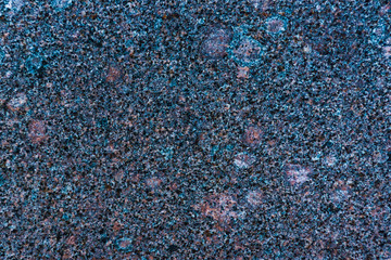 Polished stone background - multicolored granite texture
