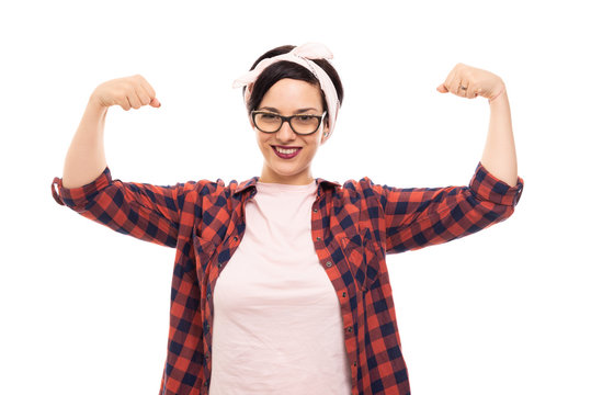 Pretty pin-up girl wearing glasses showing both her biceps.