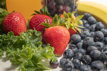 Close Up Strawberries Juice and Blueberries