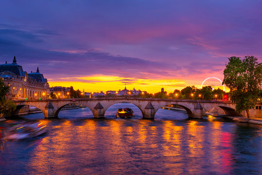 Sunset view of Seine river, Pont Royal and Orsay Museum (Musee d'Orsay) in Paris, France