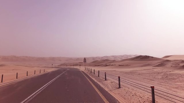 New road from Oasis Liwa to Moreeb Dune in Rub al Khali desert stock footage video