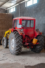 tractor in a stable 