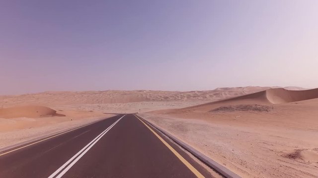 New road from Oasis Liwa to Moreeb Dune in Rub al Khali desert stock footage video