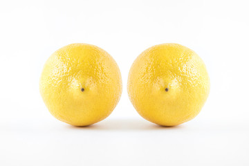 two lemons, conceptual image of woman body