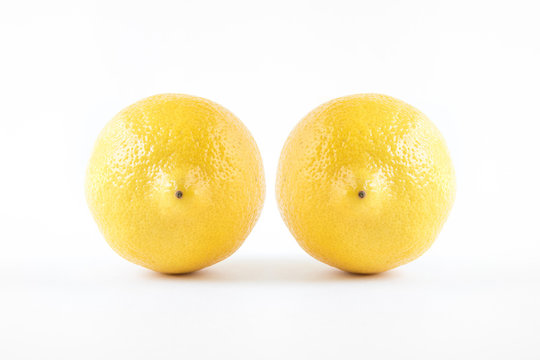 two lemons, conceptual image of woman body