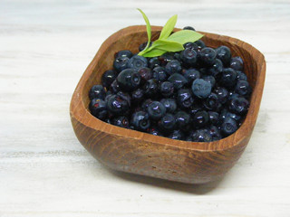 Concept for healthy nutrition. Blubberies on shabby table