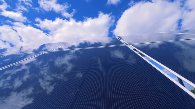 Modern solar panel in the open air is reflecting the sky
