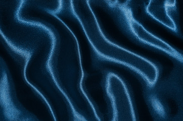 Background and wallpaper by deep blue fabric and stripe textile.