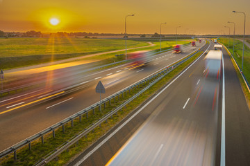 evening truck traffic on the highway