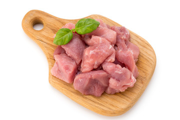 Raw chopped beef meat pieces isolated om white background cut out.