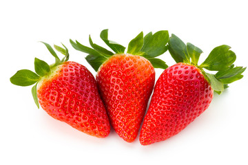 Fresh strawberries close up on white background.