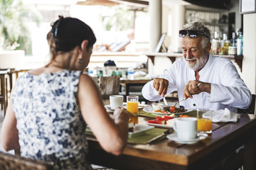 Fototapeta na wymiar Couple eating a hotel breakfast