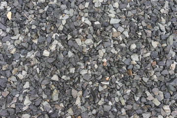natural background of gray and wet gravel stones.