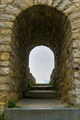Fototapeta na wymiar Stone tunnel with steps