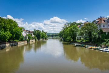 Fototapeta na wymiar Germany, Many rental boats on neckar river inm the middle of Tuebingen