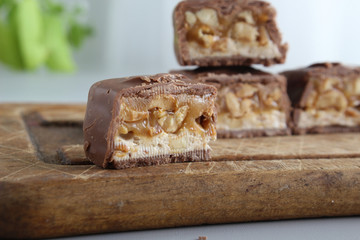 chocolate candy bar with peanuts and nougat