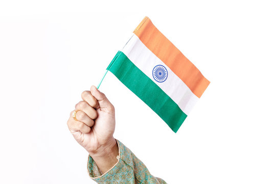 young Indian man holding Indian flag
