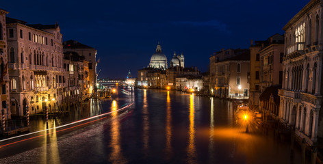 Italy Venice grand canal at night from Academia bridge and light rays
