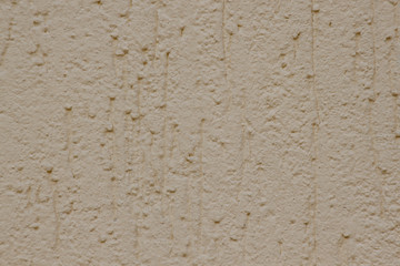 Beautiful decorative brown plastered wall. Rough texture.