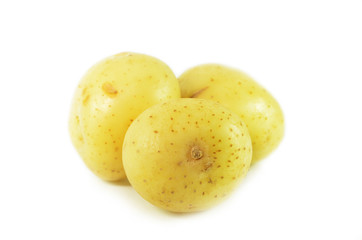 Three whole raw potatoes