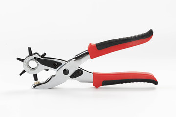 Multiple revolving diameters puncher on white backgroung