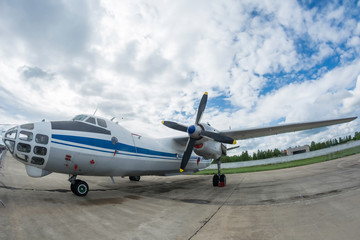 Funny turboprop plane with two engines Is standing at the airbase. observation aircraft. aerial photography. Search plane.