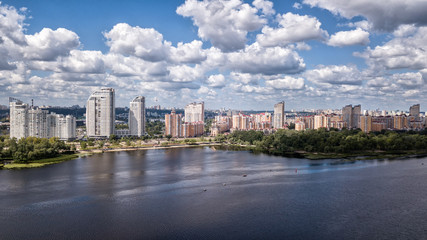 Fototapeta na wymiar Kiev bridge Fursy in sunny weathering from the air