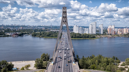 Fototapeta na wymiar Kiev bridge Fursy in sunny weathering from the air