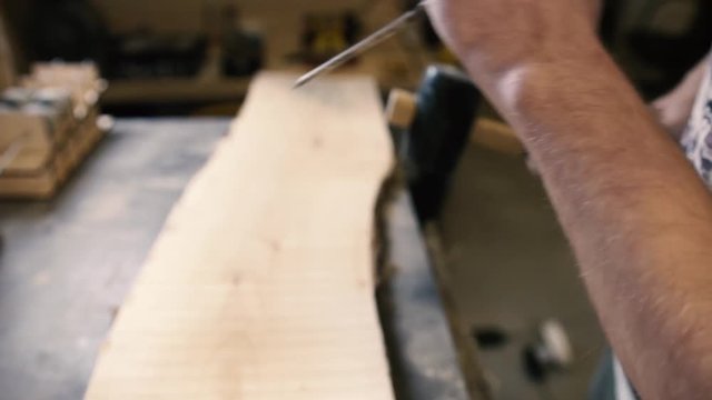 Industrial carpenter worker operating wood