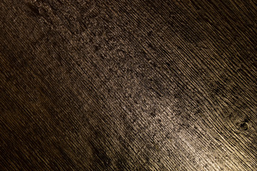 Old wood close-up with side lighting. Blanks for the designer.