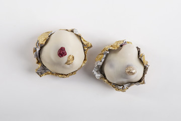 Marzipan sweets on white background, top view