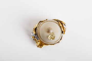 White chocolate candy on white background from top