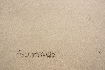 Summer Text message in sand on the beach