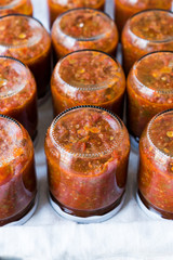 Homemade Preserved Tomato Paste Sauce in Glass Jar.