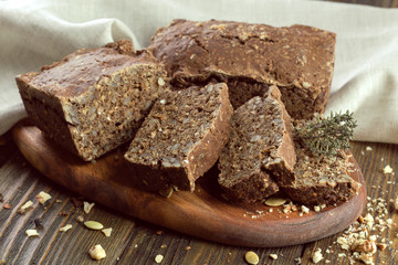 baked bread on wooden table background