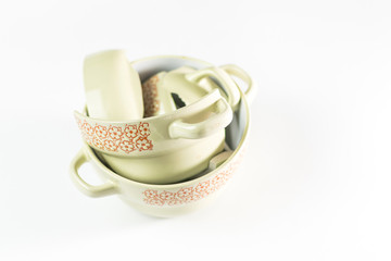 Broken and whole plate on a light background.