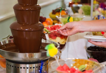chocolate fountain with fruits for weddings