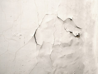 Texture of an old wall with cracks. Background