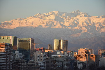 landscape of mountain snow and cityscape