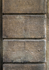 The wall of the old house. Cracks on the surface. Background