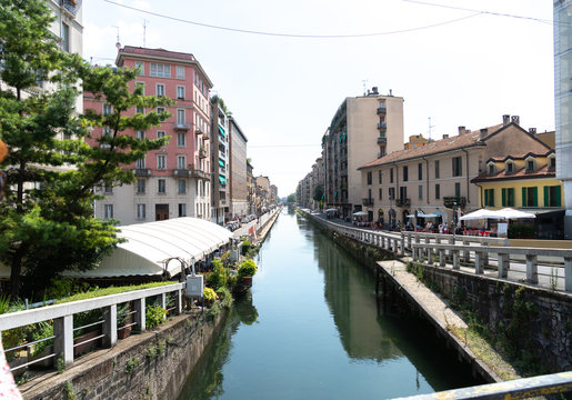 Naviglio grand canal. Navigli were a system of navigable and interconnected canals around Milan. Today, the Naviglio Grande and the Naviglio Pavese are a nightlife pole