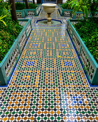 Fountain and mosaic floor in the El Badi Palace, Marrakech, Morocco