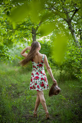 Yong woman white dress travel in park,