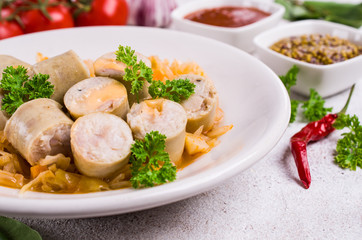 Slices of natural sausages with cheese