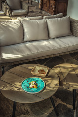 exclusive cheese mousse with marinated walnuts and golden beetroot served on turquoise plate, top gastronomy 