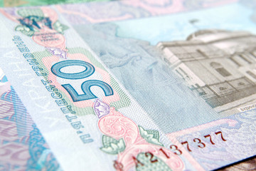 Fragment of the Ukrainian banknote fifty hryvnias selective focus
